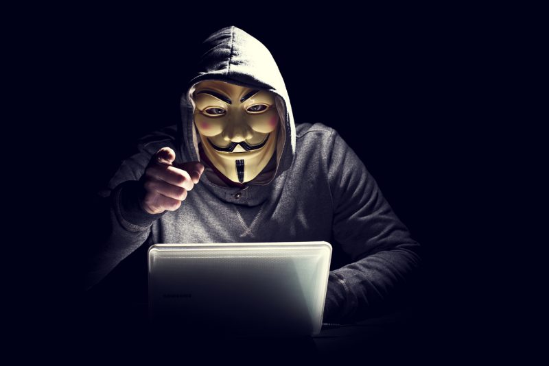 portrait of hacker with mask